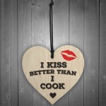 I Kiss Better Than I Cook Novelty Wooden Hanging Heart