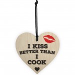 I Kiss Better Than I Cook Novelty Wooden Hanging Heart