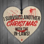 Survived Christmas With In-Laws Novelty Wooden Heart Plaque