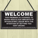 Welcome Ridiculous Amounts Of Liquor Hanging Plaque 