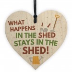 What Happens In The Shed Garden Hanging Wooden Heart Plaque 