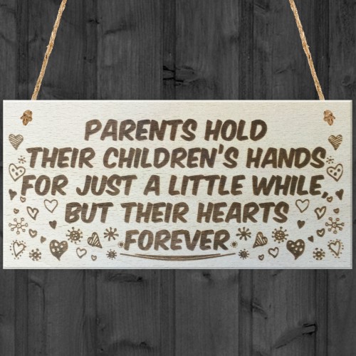 Parents Hold Their Childrens Hearts Wooden Hanging Plaque Sign