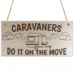 Caravaners Do It On The Move Novelty Wooden Hanging Plaque