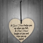 A Best Friend Trips You When You Fall Wooden Hanging Heart