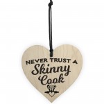 Never Trust A Skinny Cook Novelty Wooden Hanging Heart Plaque