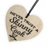 Never Trust A Skinny Cook Novelty Wooden Hanging Heart Plaque